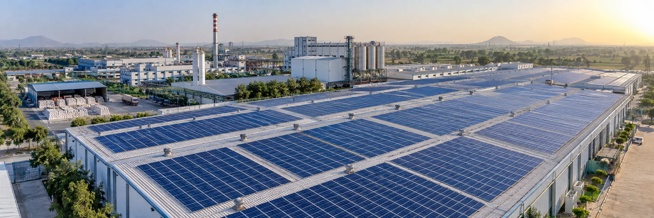Aerial view of a large rooftop solar installation on an Indian textile factory