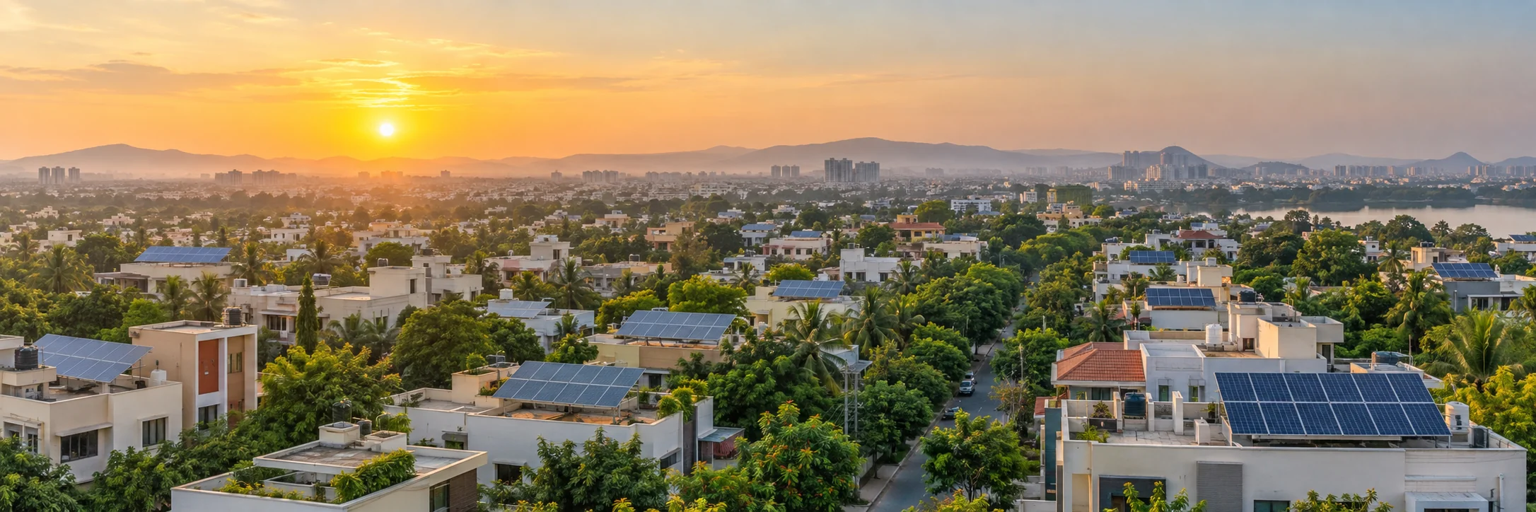 Solar rooftops across a leafy Indian neighborhood at sunrise
